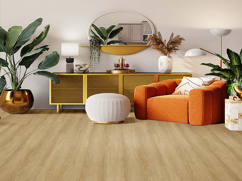 A contemporary living room featuring the Room-Scene-SmartDrop-Elite-7-Netsuke, with an orange armchair, white pouf, gold sideboard, leafy plants, a table lamp, and a round mirror above the sideboard.